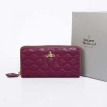 艶やかな光沢 VIVIENNE WESTWOOD 二つ折り小銭入れ 高級感溢れる長財布　ウォレット.112.